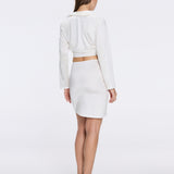 Greta White Satin Long Sleeve Tie Front Shirt | Moeva | Beachwear Tops | Each week unveils new pieces—luxury swimwear, fluid resort silhouettes, and elevated summer-to-evening essentials designed to carry you from coastal escapes to city nights.