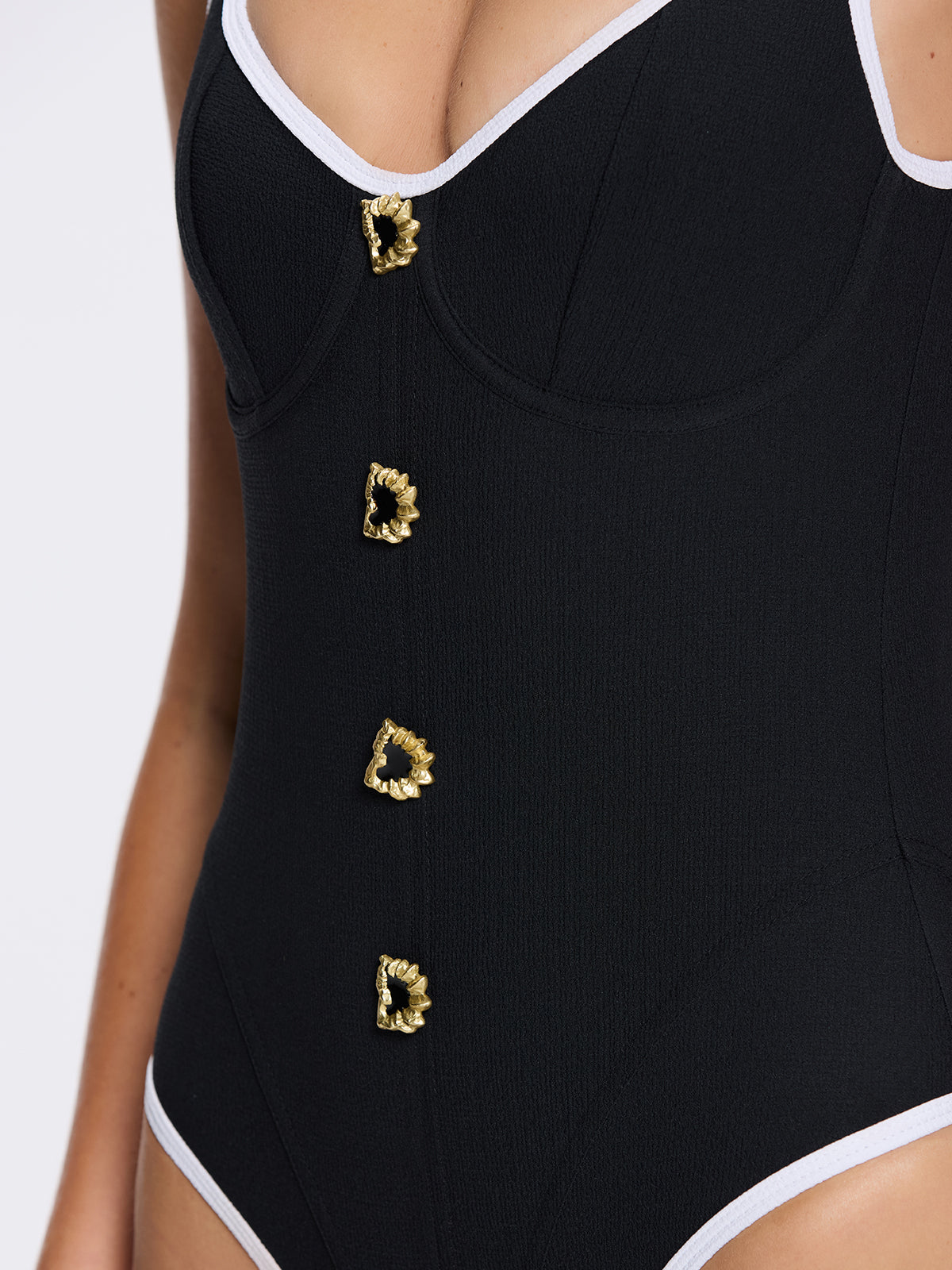 Azurea Underwired Gold Button Detail Black Swimsuit | Moeva | Swimsuit | Each week unveils new pieces—luxury swimwear, fluid resort silhouettes, and elevated summer-to-evening essentials designed to carry you from coastal escapes to city nights.