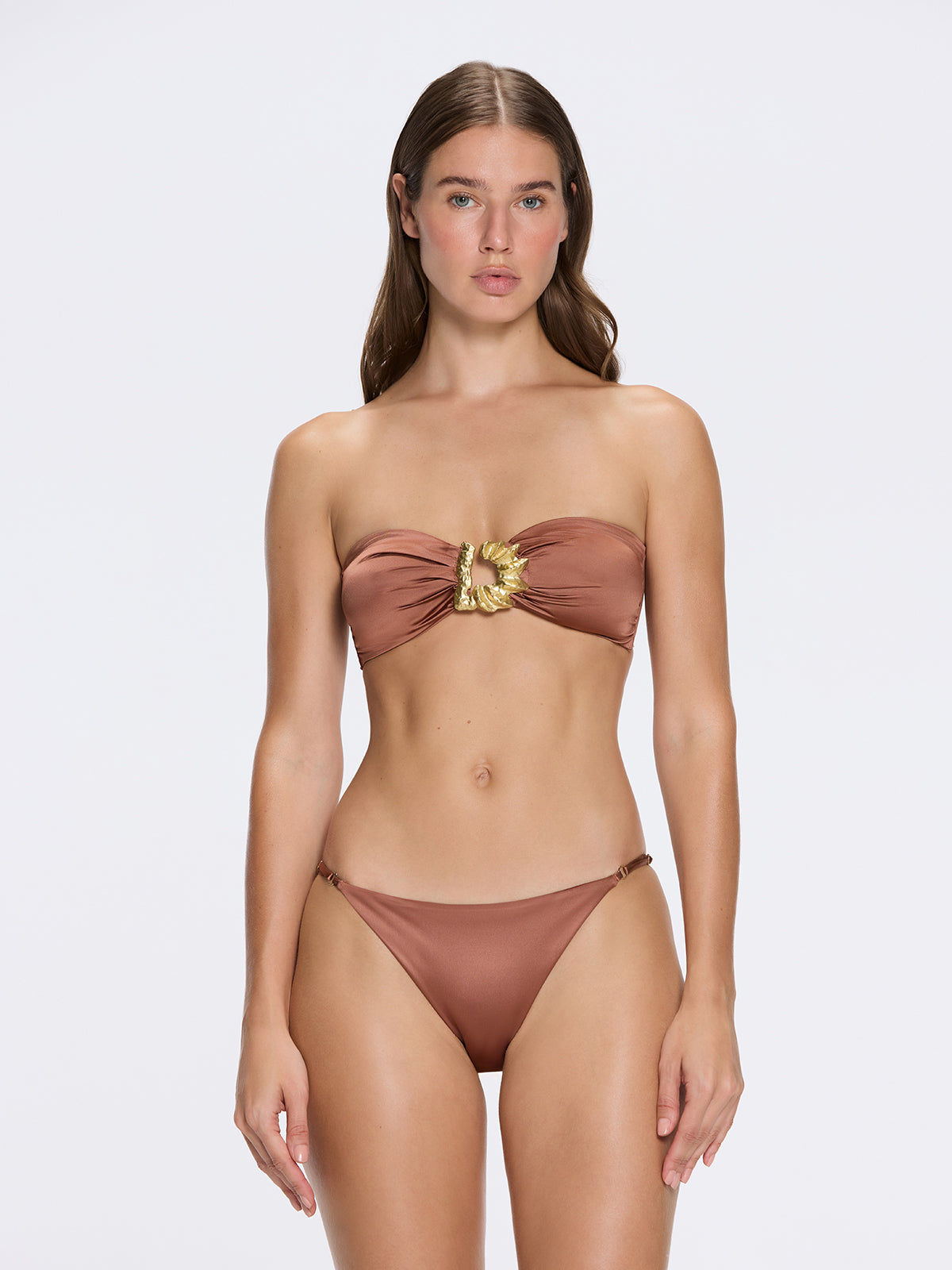 Astrid Bandeau Gold Detail Mid Coverage Satin Brown Bikini Set | Moeva | Bikini Set | Each week unveils new pieces—luxury swimwear, fluid resort silhouettes, and elevated summer-to-evening essentials designed to carry you from coastal escapes to city nights.