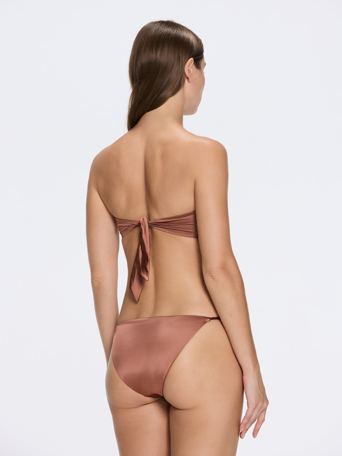 Astrid Bandeau Gold Detail Mid Coverage Satin Brown Bikini Set | Moeva | Bikini Set | Each week unveils new pieces—luxury swimwear, fluid resort silhouettes, and elevated summer-to-evening essentials designed to carry you from coastal escapes to city nights.