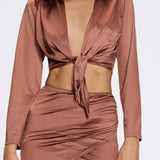 Greta Brown Satin Tie Front Shirt And Antonia Skirt Set | Moeva | Beachwear Tops | Each week unveils new pieces—luxury swimwear, fluid resort silhouettes, and elevated summer-to-evening essentials designed to carry you from coastal escapes to city nights.