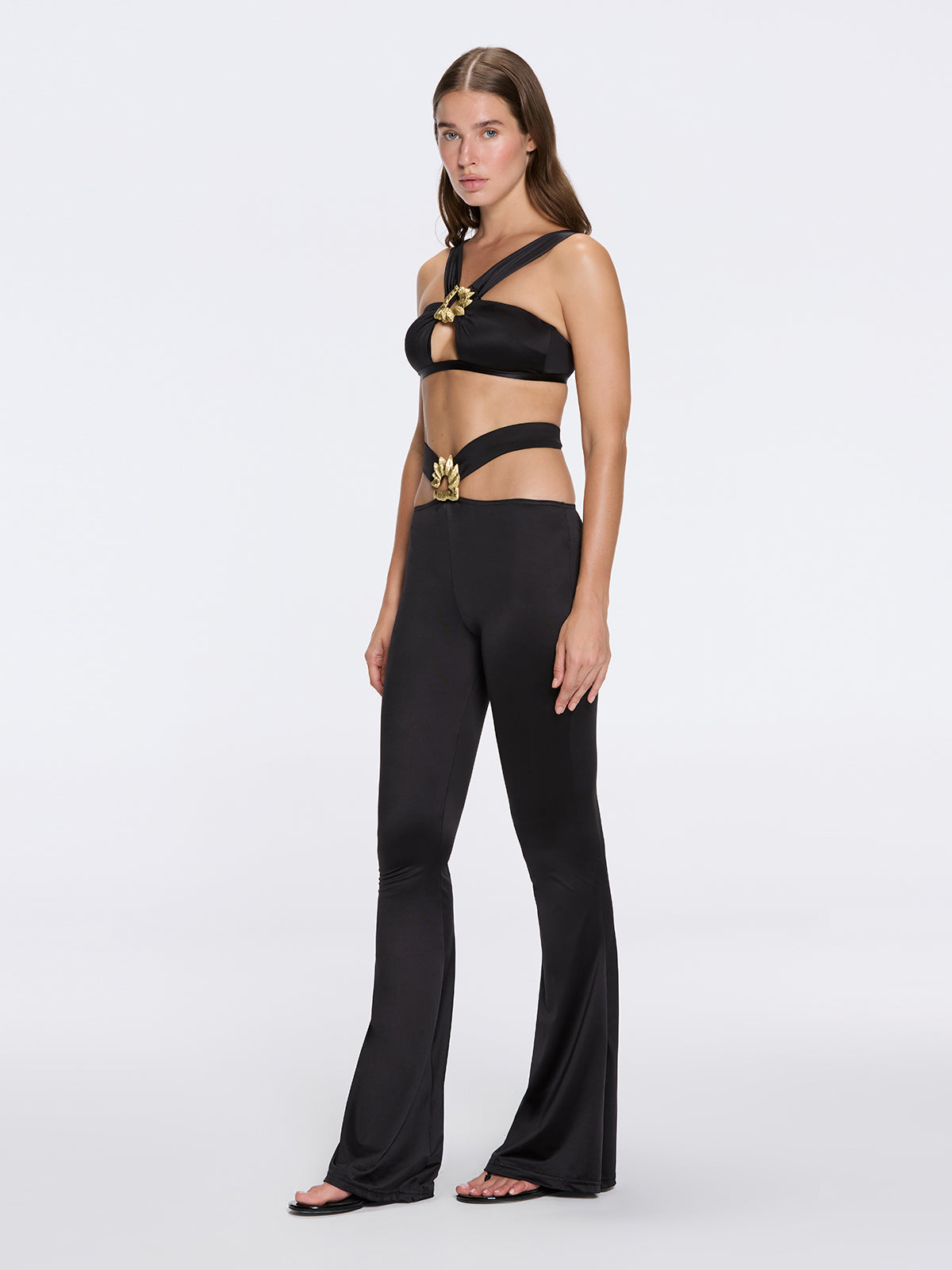 Gwyneth High-Waist with Gold Detail Satin Flare Black Pants | Moeva | Pants | Each week unveils new pieces—luxury swimwear, fluid resort silhouettes, and elevated summer-to-evening essentials designed to carry you from coastal escapes to city nights.