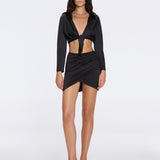 Greta Black Satin Long Sleeve Tie Front Shirt | Moeva | Beachwear Tops | Each week unveils new pieces—luxury swimwear, fluid resort silhouettes, and elevated summer-to-evening essentials designed to carry you from coastal escapes to city nights.