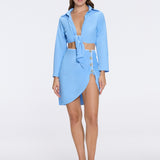 Mirazur Gold Buttoned High-Waist Mini Blue Skirt | Moeva | Skirt | Each week unveils new pieces—luxury swimwear, fluid resort silhouettes, and elevated summer-to-evening essentials designed to carry you from coastal escapes to city nights.