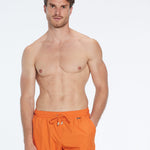 Louis Orange Quick-Dry Swim Shorts | Moeva | Shorts | Each week unveils new pieces—luxury swimwear, fluid resort silhouettes, and elevated summer-to-evening essentials designed to carry you from coastal escapes to city nights.