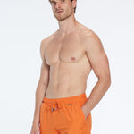 Louis Orange Quick-Dry Swim Shorts | Moeva | Shorts | Each week unveils new pieces—luxury swimwear, fluid resort silhouettes, and elevated summer-to-evening essentials designed to carry you from coastal escapes to city nights.