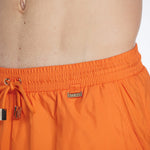 Louis Orange Quick-Dry Swim Shorts | Moeva | Shorts | Each week unveils new pieces—luxury swimwear, fluid resort silhouettes, and elevated summer-to-evening essentials designed to carry you from coastal escapes to city nights.
