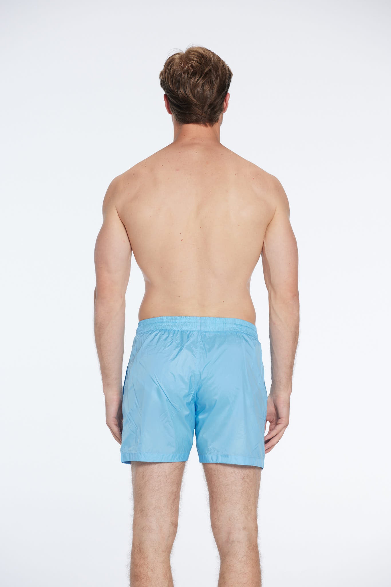 Louis Turquoise Quick-Dry Swim Shorts | Moeva | Men Ultralight Swim Shorts | Each week unveils new pieces—luxury swimwear, fluid resort silhouettes, and elevated summer-to-evening essentials designed to carry you from coastal escapes to city nights.