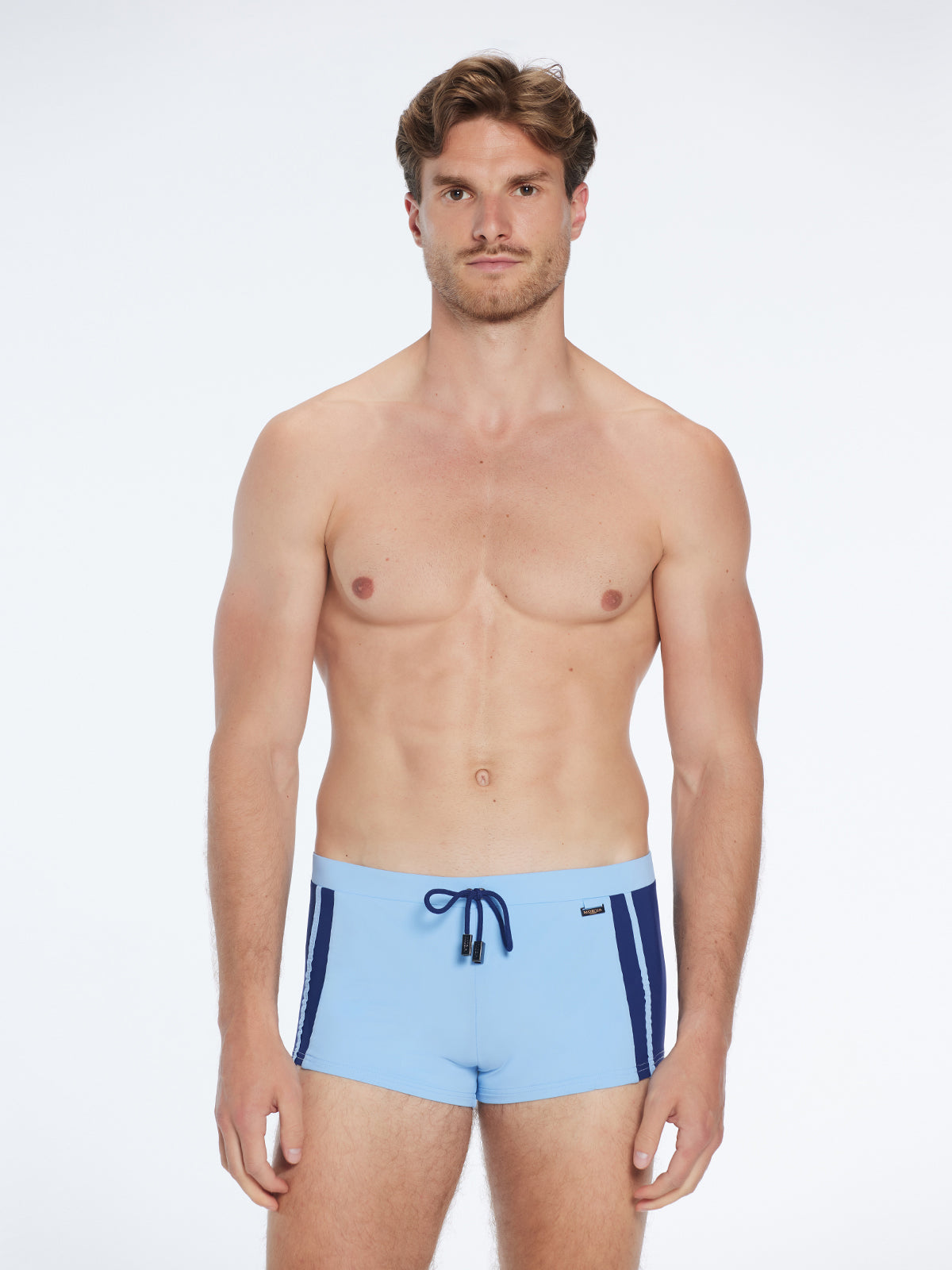 Antonio Baby Blue / Blue Swim Trunks with Drawcord | Moeva | Trunks | Each week unveils new pieces—luxury swimwear, fluid resort silhouettes, and elevated summer-to-evening essentials designed to carry you from coastal escapes to city nights.
