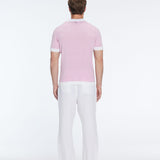 Troy Pink/White V-Neck T-Shirt with Contrast Trim | Moeva | | Each week unveils new pieces—luxury swimwear, fluid resort silhouettes, and elevated summer-to-evening essentials designed to carry you from coastal escapes to city nights.