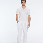 Mark White Cotton V-Neck Polo T-Shirt | Moeva | T-Shirt | Each week unveils new pieces—luxury swimwear, fluid resort silhouettes, and elevated summer-to-evening essentials designed to carry you from coastal escapes to city nights.