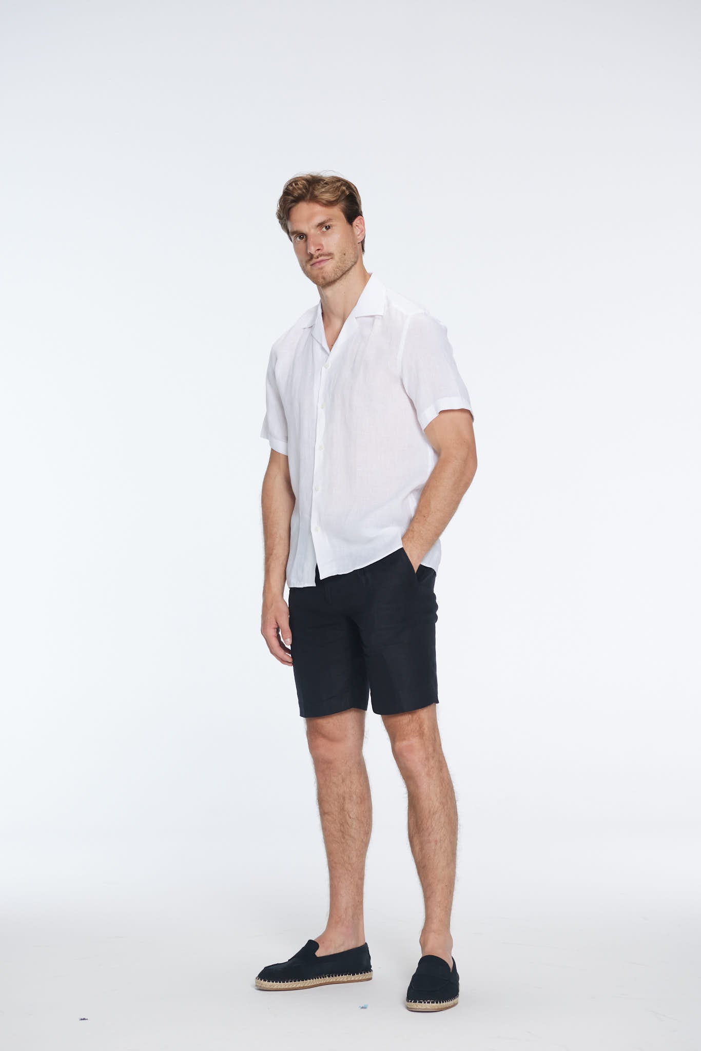 Romeo White Linen Shirt with Camp Collar | Moeva | Men Classic Collar Shirts | Each week unveils new pieces—luxury swimwear, fluid resort silhouettes, and elevated summer-to-evening essentials designed to carry you from coastal escapes to city nights.