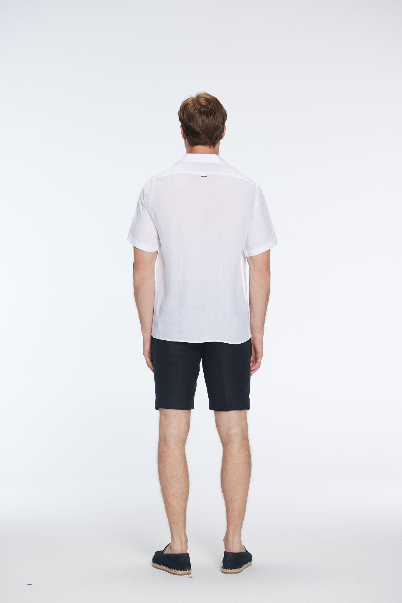 Romeo White Linen Shirt with Camp Collar | Moeva | Men Classic Collar Shirts | Each week unveils new pieces—luxury swimwear, fluid resort silhouettes, and elevated summer-to-evening essentials designed to carry you from coastal escapes to city nights.