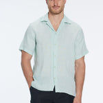 Romeo Green Linen Shirt with Camp Collar | Moeva | Shirt | Each week unveils new pieces—luxury swimwear, fluid resort silhouettes, and elevated summer-to-evening essentials designed to carry you from coastal escapes to city nights.