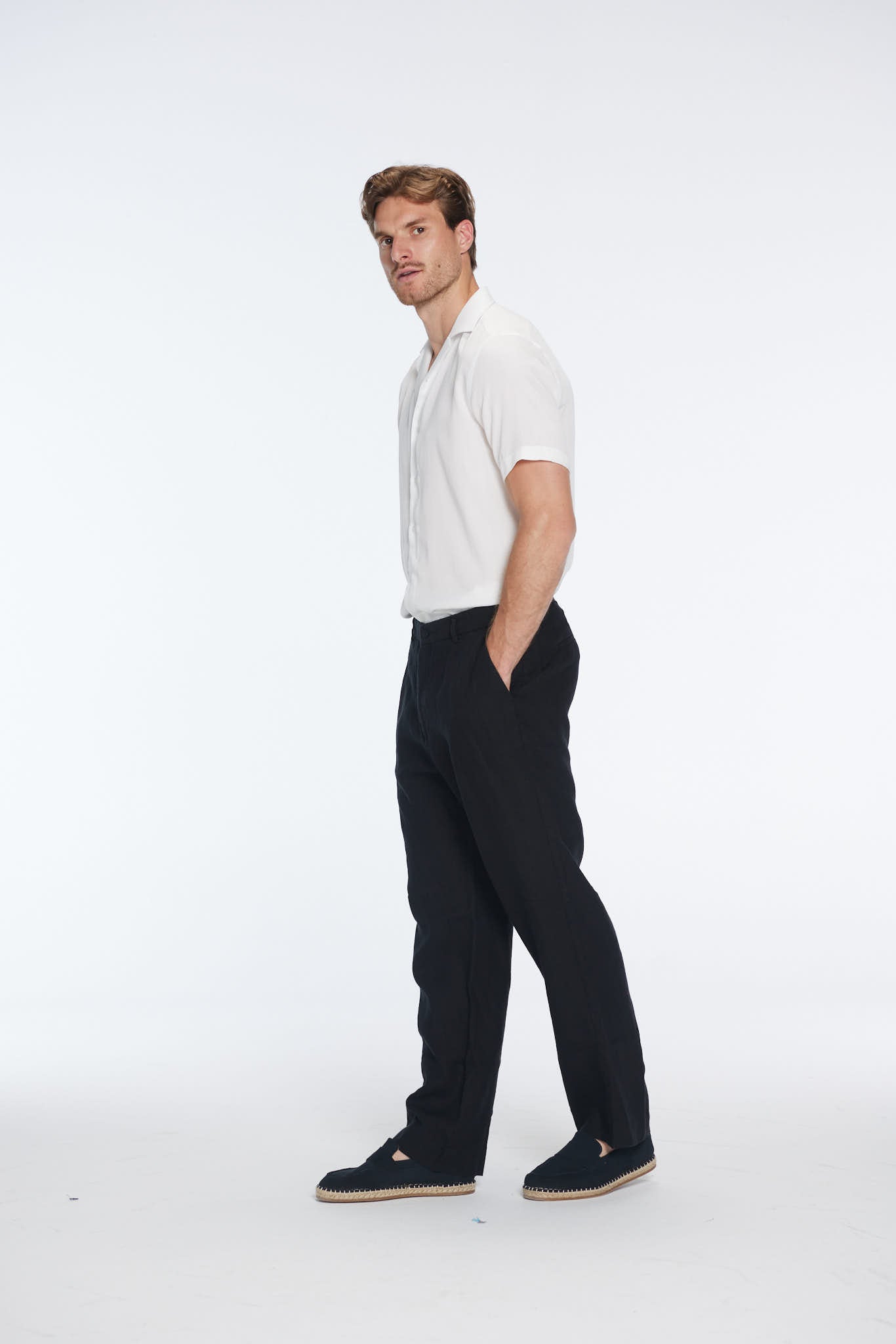 Adrian Black Linen Straight-Leg Pants | Moeva | | Each week unveils new pieces—luxury swimwear, fluid resort silhouettes, and elevated summer-to-evening essentials designed to carry you from coastal escapes to city nights.