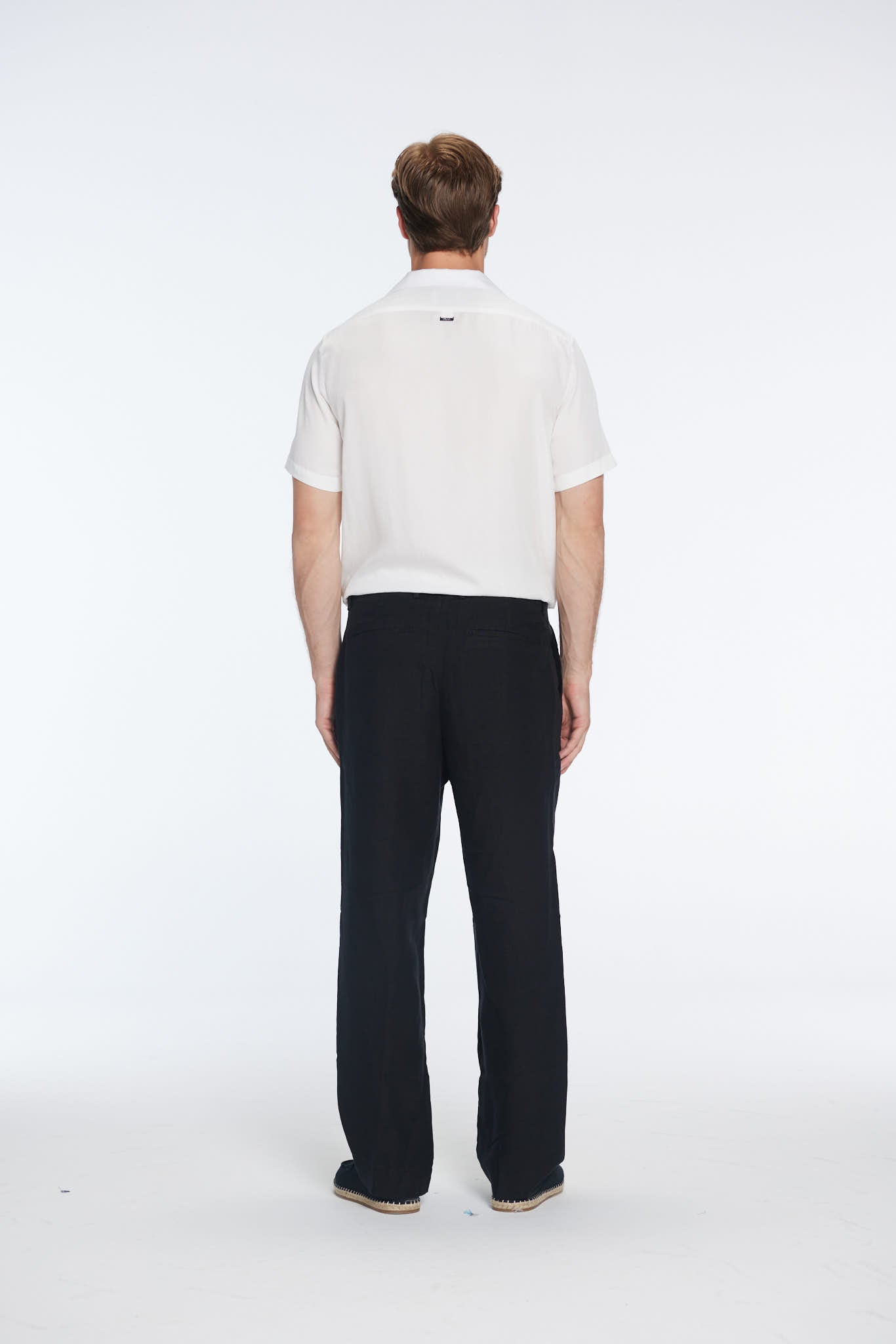 Adrian Black Linen Straight-Leg Pants | Moeva | | Each week unveils new pieces—luxury swimwear, fluid resort silhouettes, and elevated summer-to-evening essentials designed to carry you from coastal escapes to city nights.