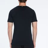 Rex Black V-Neck Cotton T-Shirt | Moeva | Men V-Neck Shirts | Each week unveils new pieces—luxury swimwear, fluid resort silhouettes, and elevated summer-to-evening essentials designed to carry you from coastal escapes to city nights.