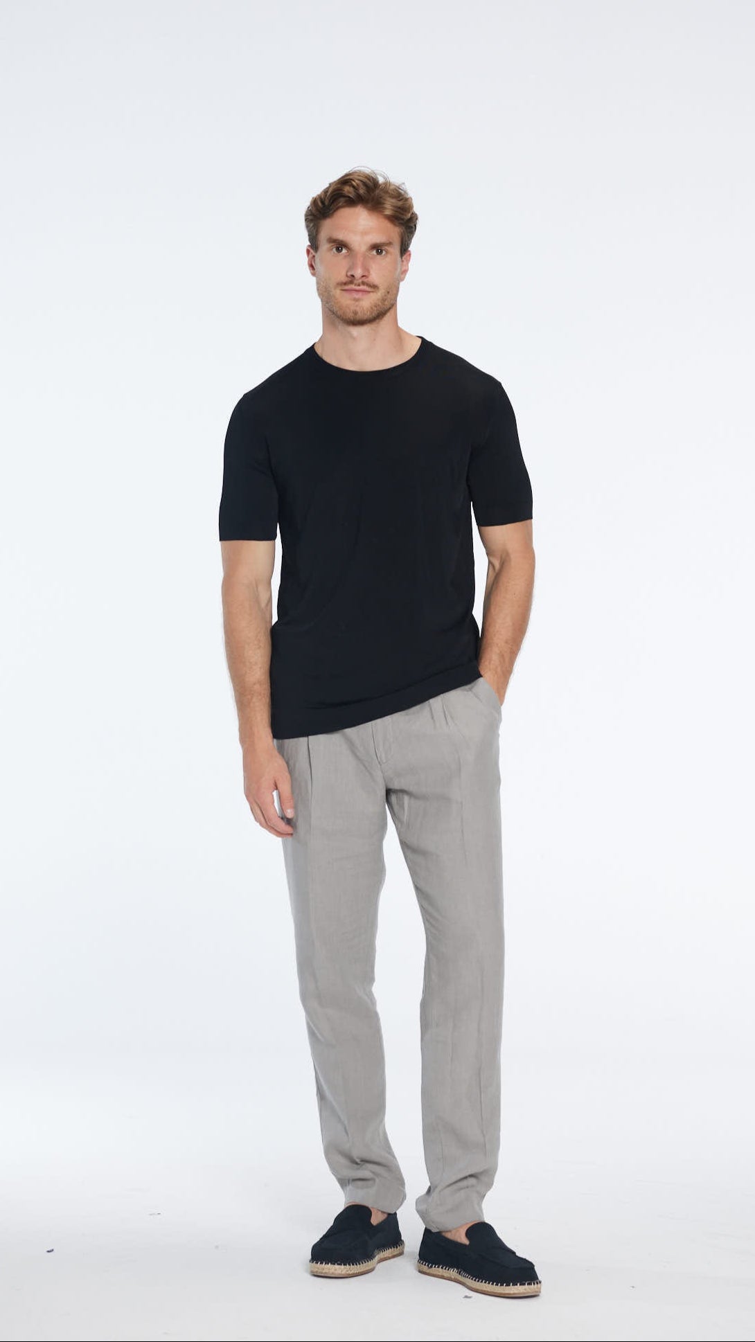 Atlas Black Cotton Round Neck T-Shirt | Moeva | Men Round Neck Shirts | Each week unveils new pieces—luxury swimwear, fluid resort silhouettes, and elevated summer-to-evening essentials designed to carry you from coastal escapes to city nights.