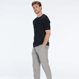 Oscar Black Round Neck T-Shirt | Moeva | Men Round Neck Shirts | Each week unveils new pieces—luxury swimwear, fluid resort silhouettes, and elevated summer-to-evening essentials designed to carry you from coastal escapes to city nights.