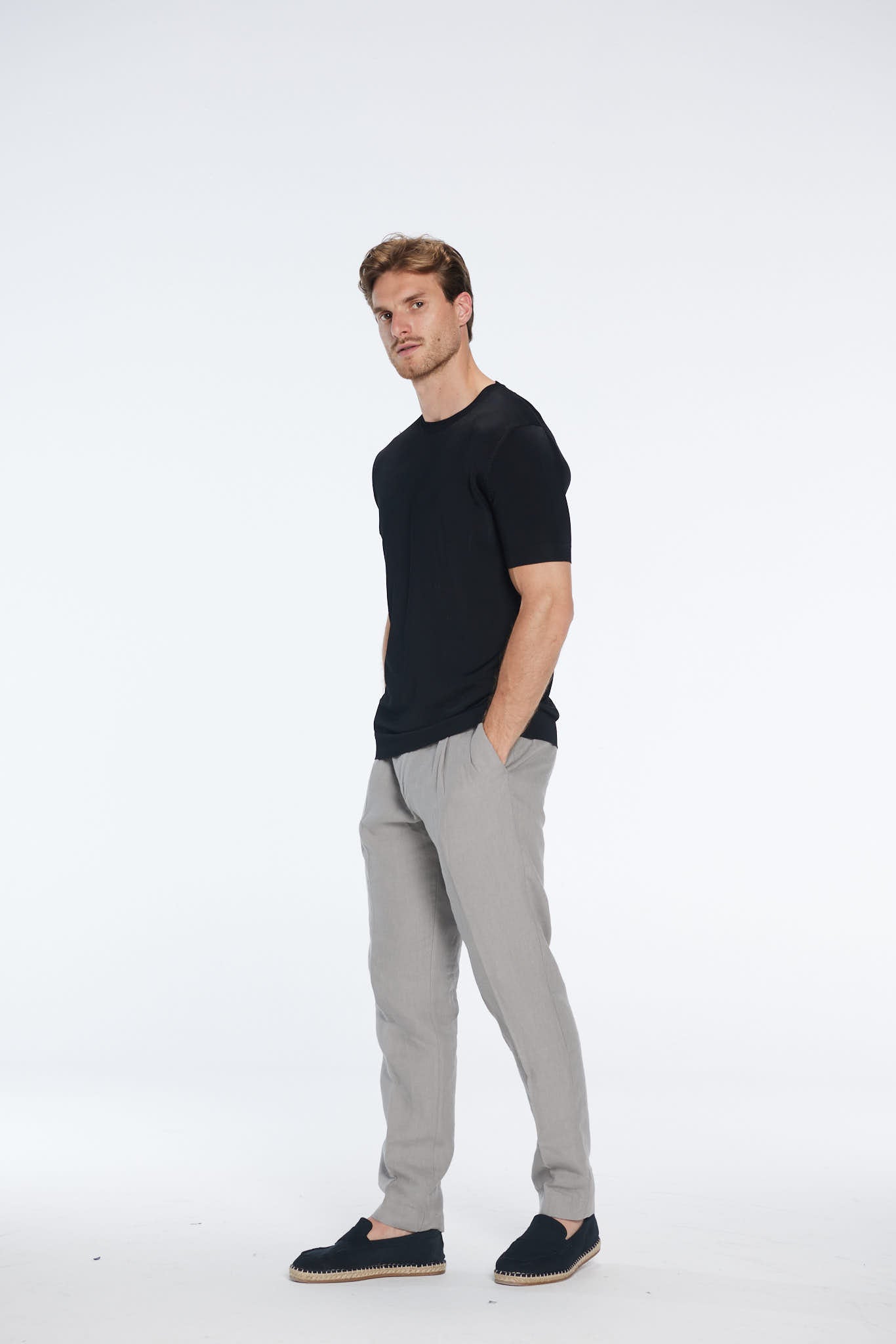 Oscar Black Round Neck T-Shirt | Moeva | Men Round Neck Shirts | Each week unveils new pieces—luxury swimwear, fluid resort silhouettes, and elevated summer-to-evening essentials designed to carry you from coastal escapes to city nights.