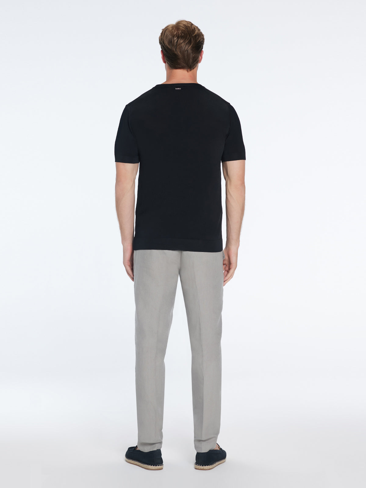 Oscar Black Round Neck T-Shirt | Moeva | T-Shirt | Each week unveils new pieces—luxury swimwear, fluid resort silhouettes, and elevated summer-to-evening essentials designed to carry you from coastal escapes to city nights.