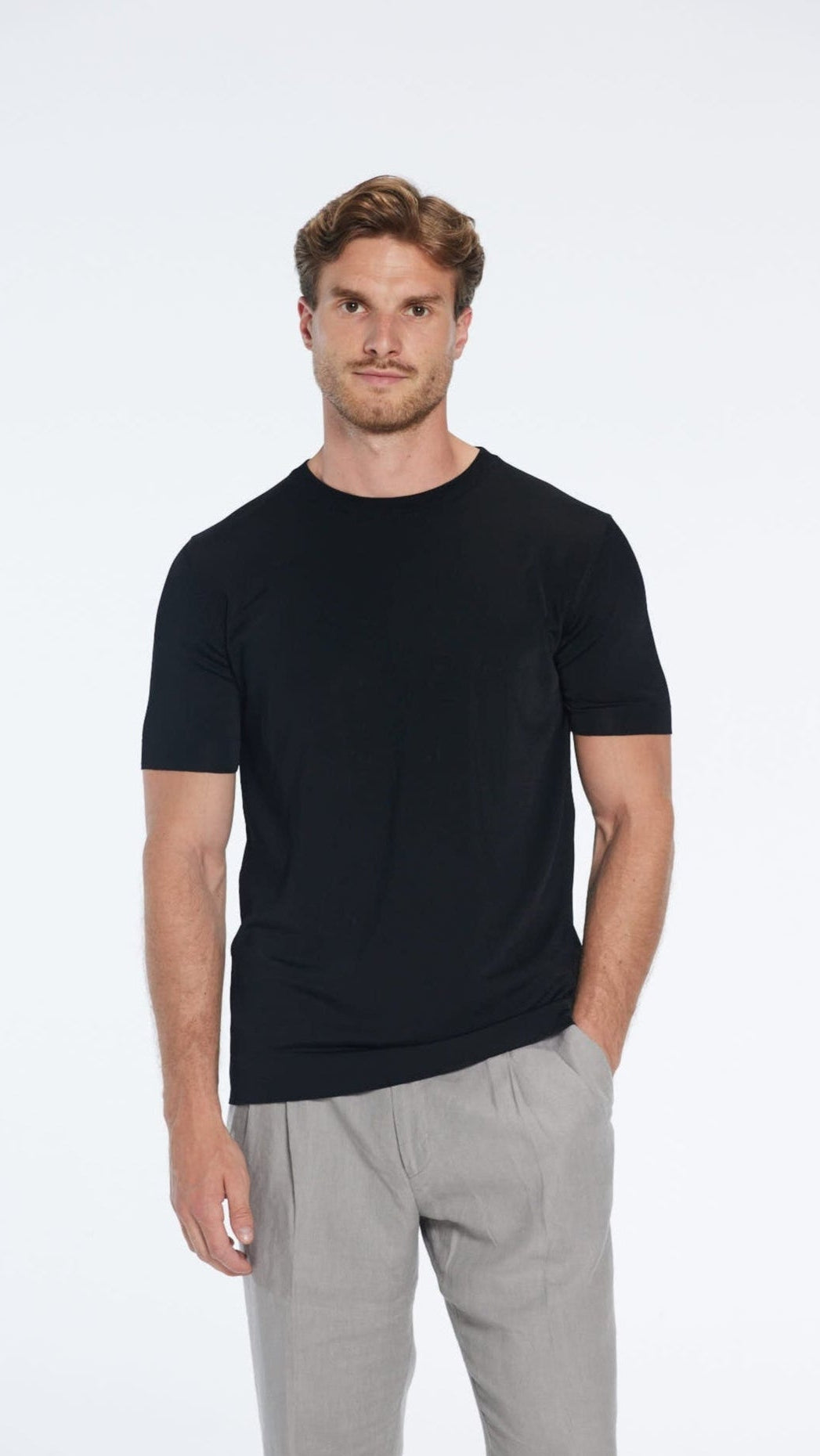 Oscar Black Round Neck T-Shirt | Moeva | T-Shirt | Each week unveils new pieces—luxury swimwear, fluid resort silhouettes, and elevated summer-to-evening essentials designed to carry you from coastal escapes to city nights.