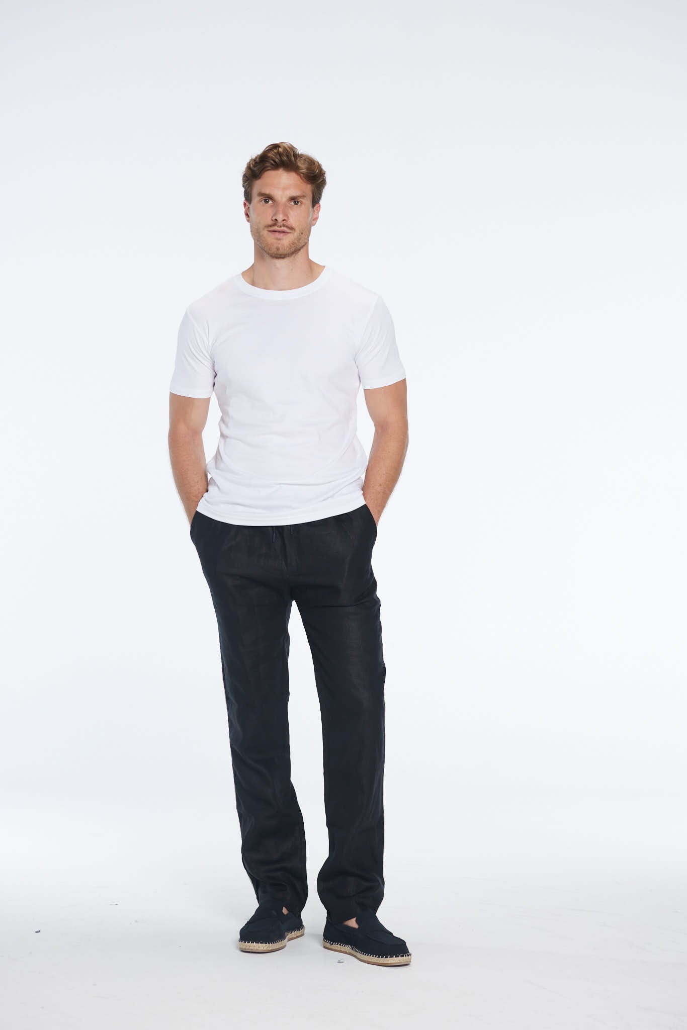Joseph Black Linen Straight-Leg Pants | Moeva | Men Pants | Each week unveils new pieces—luxury swimwear, fluid resort silhouettes, and elevated summer-to-evening essentials designed to carry you from coastal escapes to city nights.