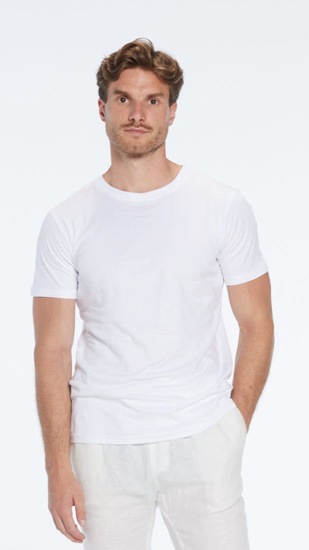 Atlas White Cotton Round Neck T-Shirt | Moeva | Men Round Neck Shirts | Each week unveils new pieces—luxury swimwear, fluid resort silhouettes, and elevated summer-to-evening essentials designed to carry you from coastal escapes to city nights.