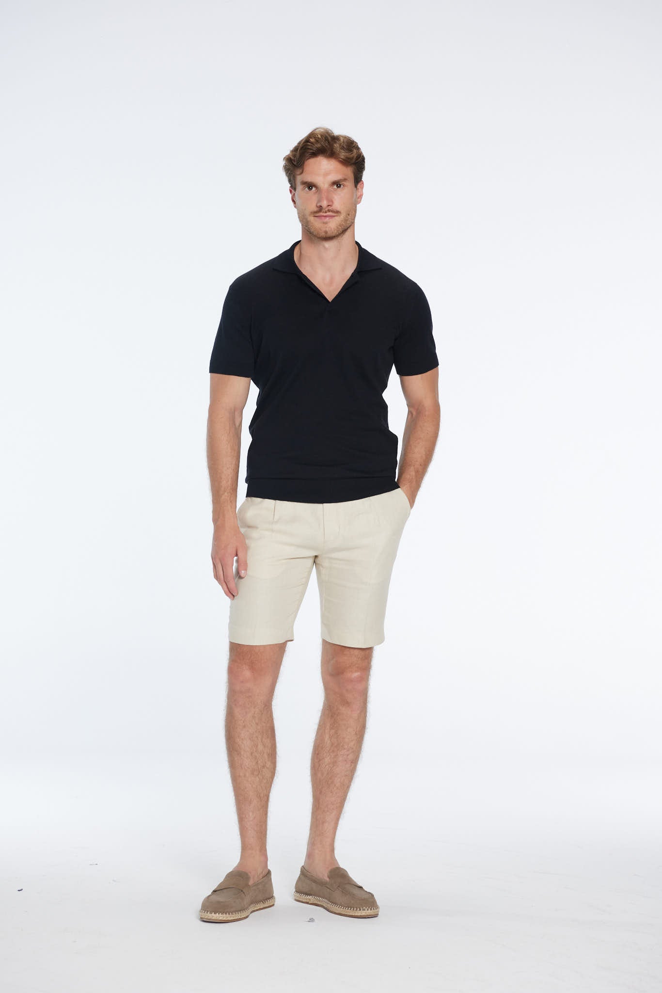 Johan Black Cotton Polo Shirt | Moeva | Men Polo Shirts | Each week unveils new pieces—luxury swimwear, fluid resort silhouettes, and elevated summer-to-evening essentials designed to carry you from coastal escapes to city nights.
