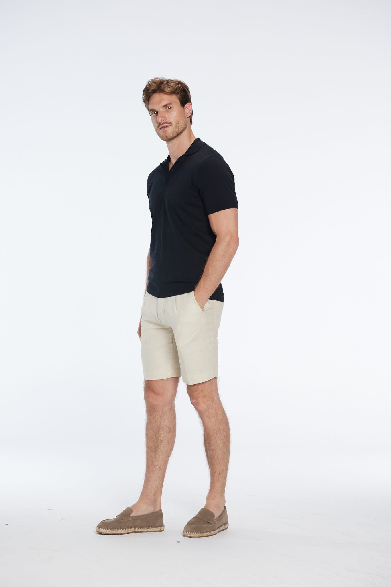 Johan Black Cotton Polo Shirt | Moeva | Men Polo Shirts | Each week unveils new pieces—luxury swimwear, fluid resort silhouettes, and elevated summer-to-evening essentials designed to carry you from coastal escapes to city nights.