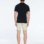 Johan Black Cotton Polo Shirt | Moeva | T-Shirt | Each week unveils new pieces—luxury swimwear, fluid resort silhouettes, and elevated summer-to-evening essentials designed to carry you from coastal escapes to city nights.