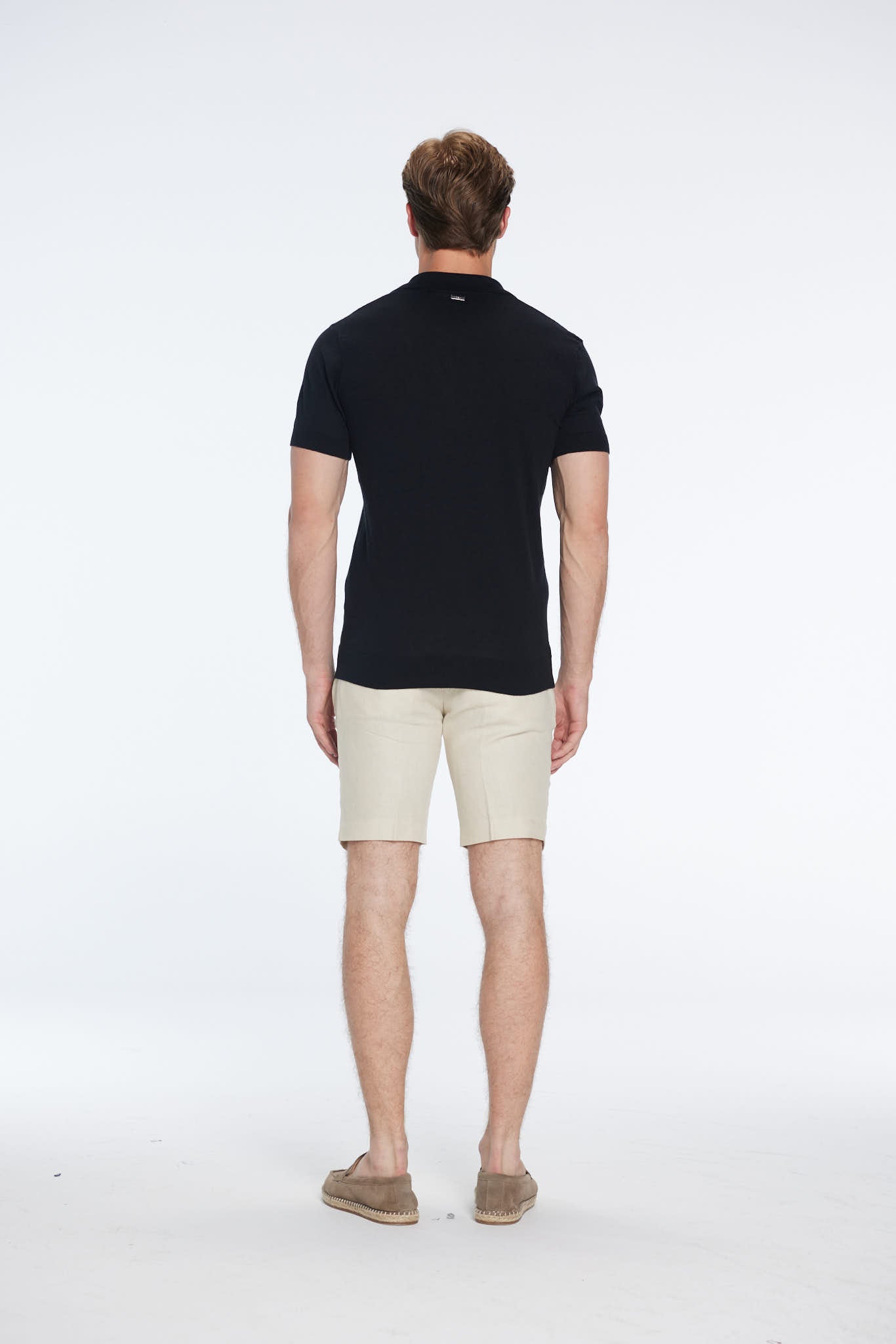 Johan Black Cotton Polo Shirt | Moeva | Men Polo Shirts | Each week unveils new pieces—luxury swimwear, fluid resort silhouettes, and elevated summer-to-evening essentials designed to carry you from coastal escapes to city nights.
