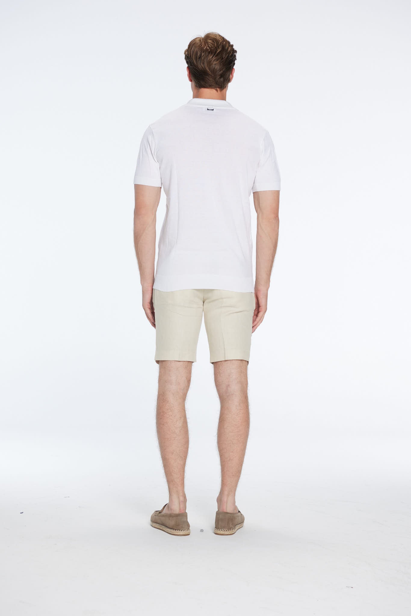 Johan White Cotton Polo Shirt | Moeva | Men Polo Shirts | Each week unveils new pieces—luxury swimwear, fluid resort silhouettes, and elevated summer-to-evening essentials designed to carry you from coastal escapes to city nights.
