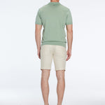 Johan Green Cotton Polo Shirt | Moeva | T-Shirt | Each week unveils new pieces—luxury swimwear, fluid resort silhouettes, and elevated summer-to-evening essentials designed to carry you from coastal escapes to city nights.