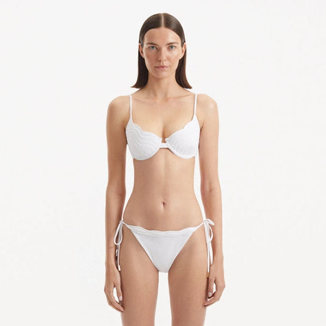 Salila White Underwired Side Tie Wave Textured Bikini Set | Moeva | Bikini Set | Each week unveils new pieces—luxury swimwear, fluid resort silhouettes, and elevated summer-to-evening essentials designed to carry you from coastal escapes to city nights.