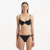 Salila Black Underwired Side Tie Wave Textured Bikini Set | Moeva | Bikini Set | Each week unveils new pieces—luxury swimwear, fluid resort silhouettes, and elevated summer-to-evening essentials designed to carry you from coastal escapes to city nights.