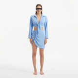Greta Baby Blue Long Sleeve Tie Front Shirt and Maeby Skirt | Moeva | | Each week unveils new pieces—luxury swimwear, fluid resort silhouettes, and elevated summer-to-evening essentials designed to carry you from coastal escapes to city nights.