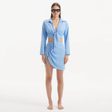 Greta Baby Blue Long Sleeve Tie Front Shirt and Maeby Skirt | Moeva | Set | Each week unveils new pieces—luxury swimwear, fluid resort silhouettes, and elevated summer-to-evening essentials designed to carry you from coastal escapes to city nights.