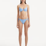 Salila Baby Blue Underwired Wave Textured Bikini Top | Moeva | Bikini Top | Each week unveils new pieces—luxury swimwear, fluid resort silhouettes, and elevated summer-to-evening essentials designed to carry you from coastal escapes to city nights.