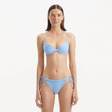 Salila Baby Blue Underwired Side Tie Wave Textured Bikini Set | Moeva | Bikini Set | Each week unveils new pieces—luxury swimwear, fluid resort silhouettes, and elevated summer-to-evening essentials designed to carry you from coastal escapes to city nights.