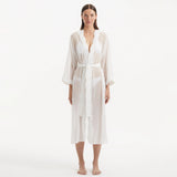 Blaze Long Sleeve Wavy-Trim Belted Sheer White Kaftan | Moeva | Kaftan | Each week unveils new pieces—luxury swimwear, fluid resort silhouettes, and elevated summer-to-evening essentials designed to carry you from coastal escapes to city nights.