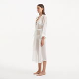 Blaze Long Sleeve Wavy-Trim Belted Sheer White Kaftan | Moeva | Kaftan | Each week unveils new pieces—luxury swimwear, fluid resort silhouettes, and elevated summer-to-evening essentials designed to carry you from coastal escapes to city nights.