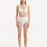 Adva White Balconette Textured Bikini Top | Moeva | Bikini Top | Each week unveils new pieces—luxury swimwear, fluid resort silhouettes, and elevated summer-to-evening essentials designed to carry you from coastal escapes to city nights.