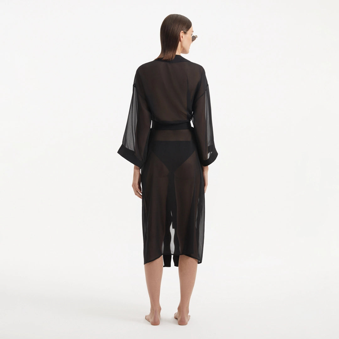 Blaze Long Sleeve Wavy-Trim Belted Sheer Black Kaftan | Moeva | Kaftan | Each week unveils new pieces—luxury swimwear, fluid resort silhouettes, and elevated summer-to-evening essentials designed to carry you from coastal escapes to city nights.