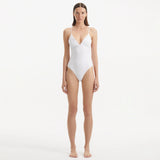 Anahita White V Neck Swimsuit | Moeva | Swimsuit | Each week unveils new pieces—luxury swimwear, fluid resort silhouettes, and elevated summer-to-evening essentials designed to carry you from coastal escapes to city nights.