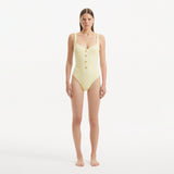 Reva Yellow Scoop Neck Textured Swimsuit | Moeva | Swimsuit | Each week unveils new pieces—luxury swimwear, fluid resort silhouettes, and elevated summer-to-evening essentials designed to carry you from coastal escapes to city nights.