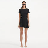 Derin Black Short-Sleeve Mini Dress | Moeva | Dress | Each week unveils new pieces—luxury swimwear, fluid resort silhouettes, and elevated summer-to-evening essentials designed to carry you from coastal escapes to city nights.