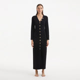 Nira Black Dress | Moeva | RTW Dresses | Each week unveils new pieces—luxury swimwear, fluid resort silhouettes, and elevated summer-to-evening essentials designed to carry you from coastal escapes to city nights.