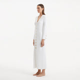 Nira White Dress | Moeva | RTW Dresses | Each week unveils new pieces—luxury swimwear, fluid resort silhouettes, and elevated summer-to-evening essentials designed to carry you from coastal escapes to city nights.