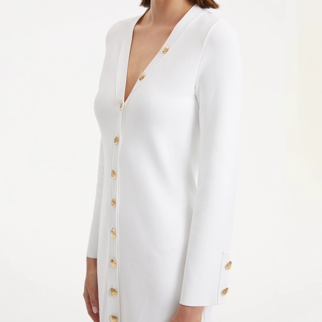 Nira White Dress | Moeva | RTW Dresses | Each week unveils new pieces—luxury swimwear, fluid resort silhouettes, and elevated summer-to-evening essentials designed to carry you from coastal escapes to city nights.